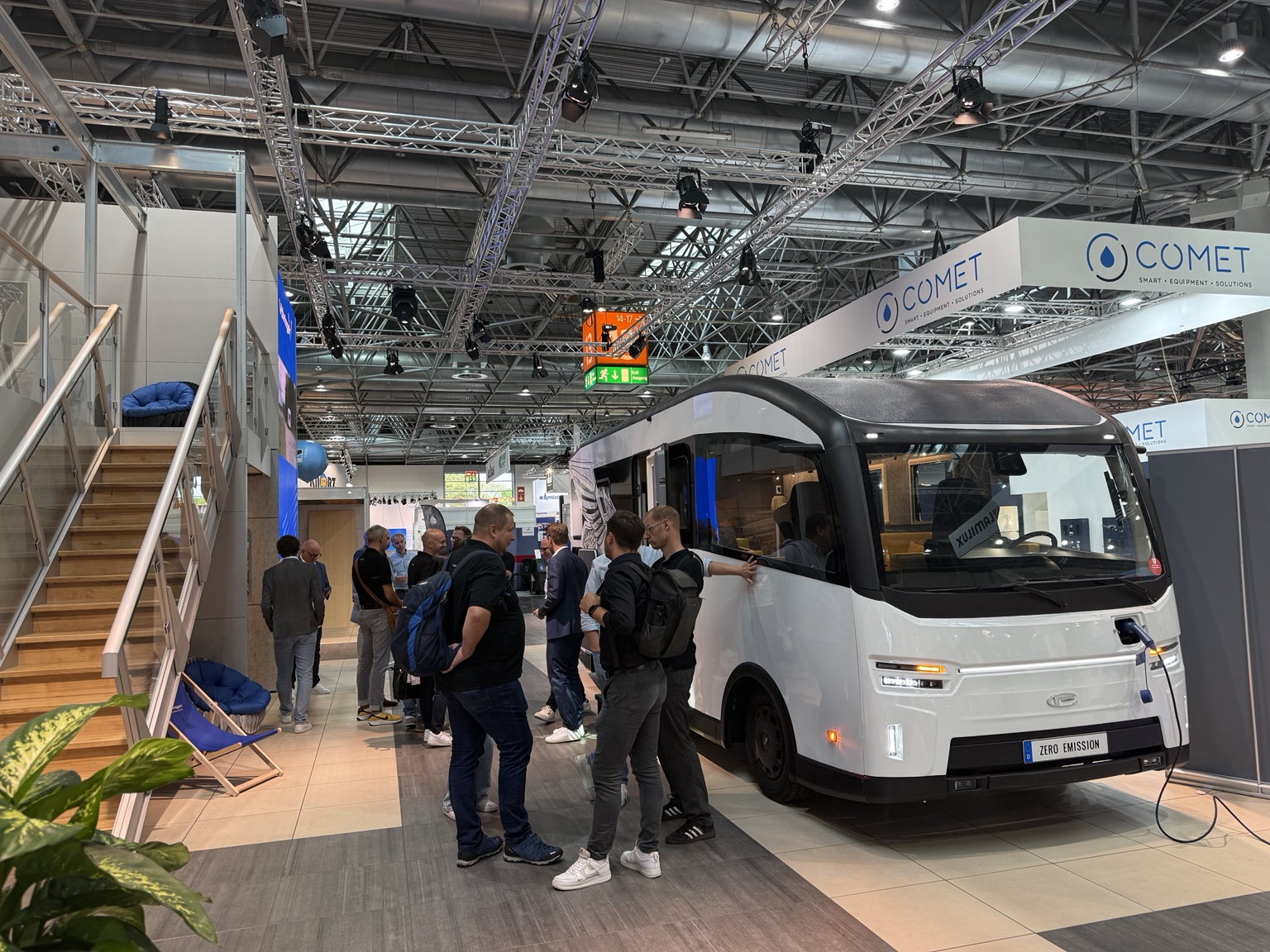 Visitors discussing the EVOLVE demonstrator at CARAVAN SALON Düsseldorf